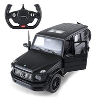 A black Mercedes-AMG G 63 remote control car, scaled at 1:14, is packaged inside a white and red box. The "RASTAR" brand logo is visible on the top left of the box. The car is visible through a clear plastic window in the packaging.