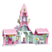A white background with a colorful toy building set. The building is a two-story pastel-colored house with a tall pink steeple. The set is shown with its overall dimensions: 36.8 cm (length), 19.2 cm (width), and 32.3 cm (height).